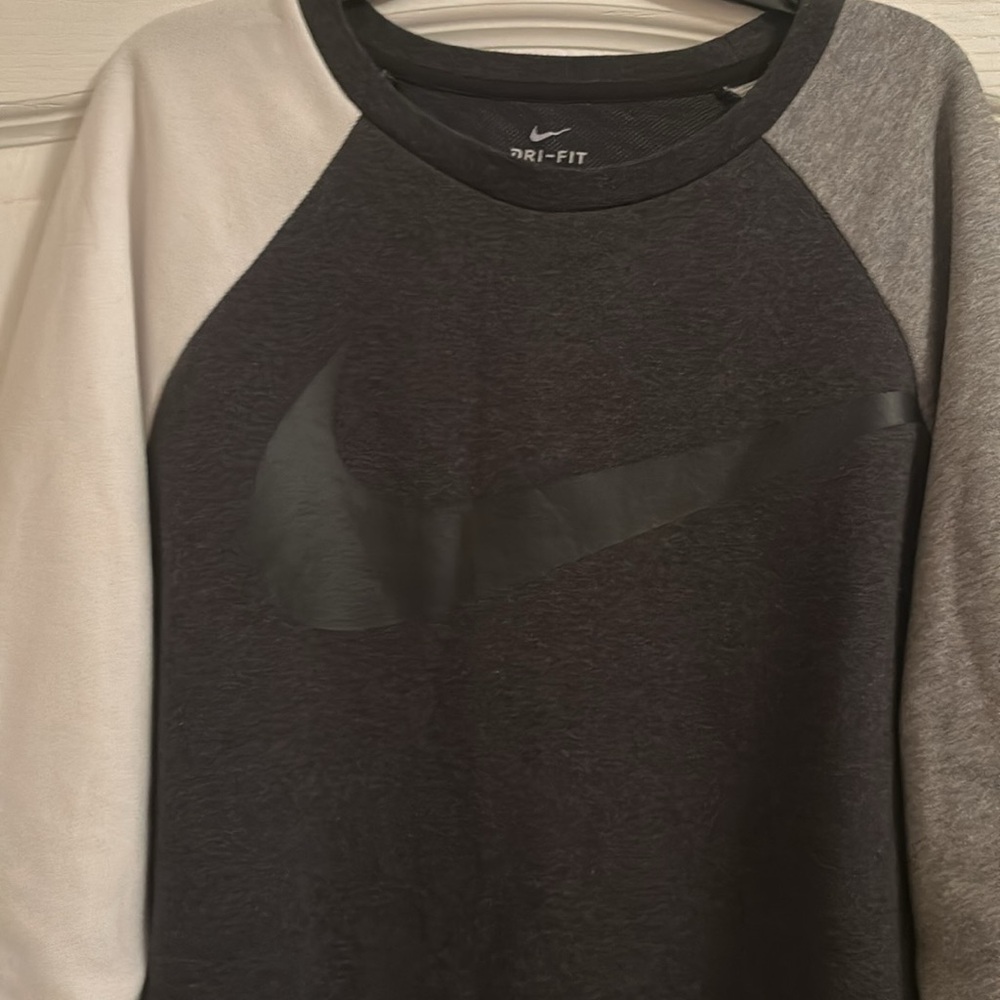 Nike dry fit women’s black sweatshirt with cream and dark gray sleeves